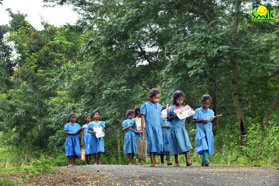 Girls from a tribal region of India going to a Mission Education school of Smile Foundation
