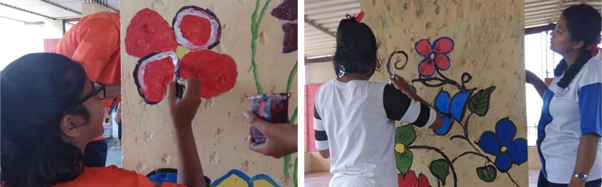 FIS employees paint walls of Mission Education centre